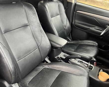 Белый Мицубиси Аутлендер, объемом двигателя 2.27 л и пробегом 240 тыс. км за 14500 $, фото 7 на Automoto.ua