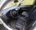 Білий Міцубісі Аутлендер, об'ємом двигуна 2.3 л та пробігом 228 тис. км за 12000 $, фото 4 на Automoto.ua