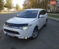 Белый Мицубиси Аутлендер, объемом двигателя 2 л и пробегом 344 тыс. км за 9999 $, фото 1 на Automoto.ua