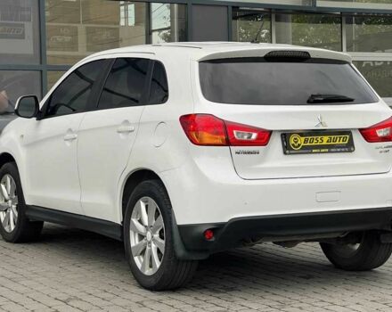 Білий Міцубісі Аутлендер, об'ємом двигуна 2 л та пробігом 224 тис. км за 9900 $, фото 4 на Automoto.ua