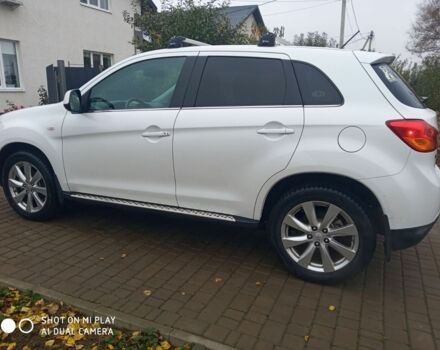 Білий Міцубісі Аутлендер, об'ємом двигуна 2 л та пробігом 203 тис. км за 10750 $, фото 1 на Automoto.ua