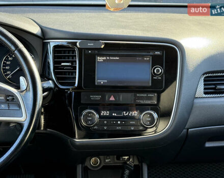 Белый Мицубиси Аутлендер, объемом двигателя 2.4 л и пробегом 148 тыс. км за 12900 $, фото 23 на Automoto.ua