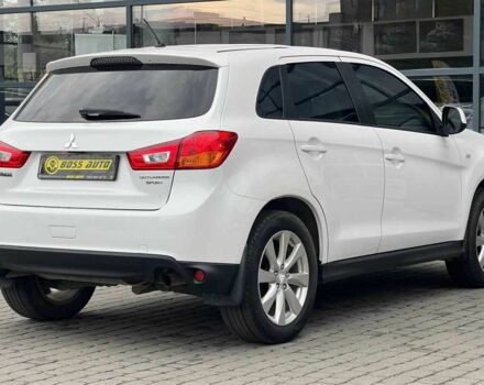 Білий Міцубісі Аутлендер, об'ємом двигуна 2 л та пробігом 224 тис. км за 9900 $, фото 6 на Automoto.ua