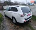 Белый Мицубиси Аутлендер, объемом двигателя 2.2 л и пробегом 278 тыс. км за 12600 $, фото 4 на Automoto.ua