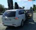 Белый Мицубиси Аутлендер, объемом двигателя 3 л и пробегом 136 тыс. км за 15200 $, фото 1 на Automoto.ua