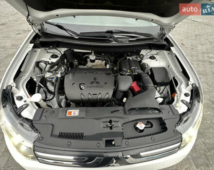 Белый Мицубиси Аутлендер, объемом двигателя 2.4 л и пробегом 175 тыс. км за 13900 $, фото 39 на Automoto.ua