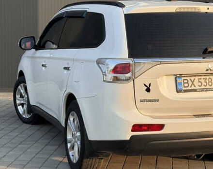 Білий Міцубісі Аутлендер, об'ємом двигуна 2.4 л та пробігом 240 тис. км за 12000 $, фото 2 на Automoto.ua