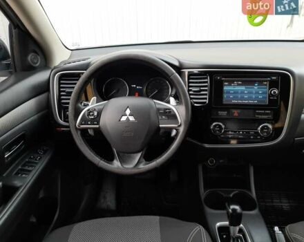 Білий Міцубісі Аутлендер, об'ємом двигуна 2 л та пробігом 245 тис. км за 12399 $, фото 5 на Automoto.ua