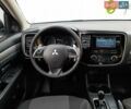Білий Міцубісі Аутлендер, об'ємом двигуна 2 л та пробігом 245 тис. км за 12399 $, фото 5 на Automoto.ua