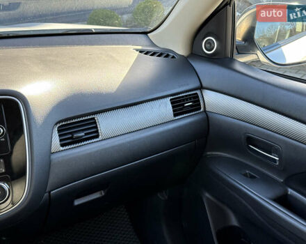 Белый Мицубиси Аутлендер, объемом двигателя 2.4 л и пробегом 148 тыс. км за 12900 $, фото 26 на Automoto.ua