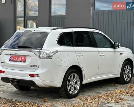 Міцубісі Аутлендер 2013 у Івано-Франківську на Automoto.ua Білий Міцубісі Аутлендер, об'ємом двигуна 2 л та пробігом 213 тис. км за 13888 $, фото 12 на Automoto.ua