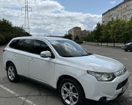 Белый Мицубиси Аутлендер, объемом двигателя 2.4 л и пробегом 210 тыс. км за 11700 $, фото 3 на Automoto.ua