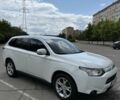 Белый Мицубиси Аутлендер, объемом двигателя 2.4 л и пробегом 210 тыс. км за 11700 $, фото 3 на Automoto.ua