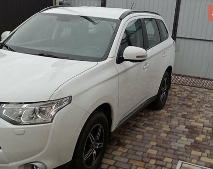 Білий Міцубісі Аутлендер, об'ємом двигуна 2.36 л та пробігом 112 тис. км за 14900 $, фото 2 на Automoto.ua