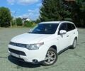Белый Мицубиси Аутлендер, объемом двигателя 3 л и пробегом 136 тыс. км за 15200 $, фото 1 на Automoto.ua