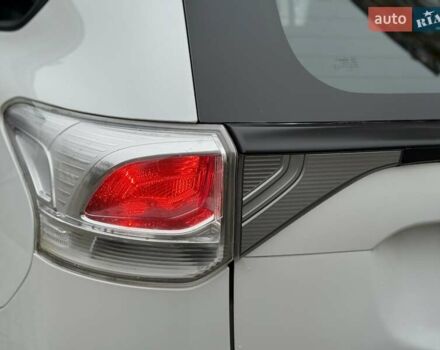 Белый Мицубиси Аутлендер, объемом двигателя 0 л и пробегом 180 тыс. км за 11500 $, фото 38 на Automoto.ua