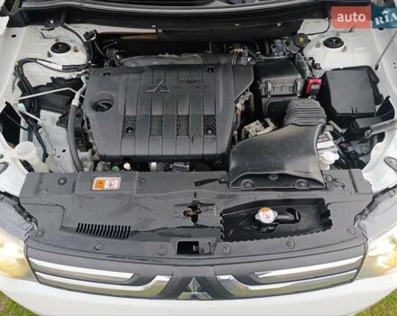 Белый Мицубиси Аутлендер, объемом двигателя 2.2 л и пробегом 278 тыс. км за 12600 $, фото 49 на Automoto.ua