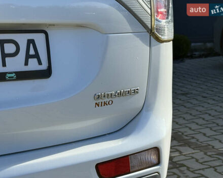 Белый Мицубиси Аутлендер, объемом двигателя 2.4 л и пробегом 148 тыс. км за 12900 $, фото 12 на Automoto.ua