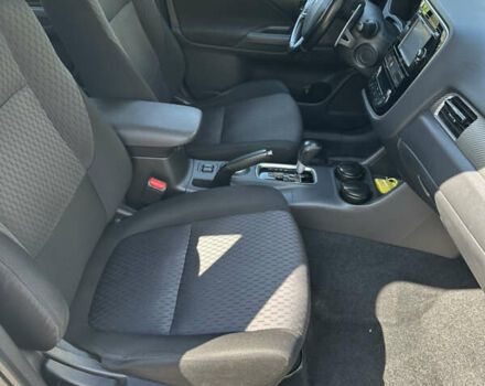 Белый Мицубиси Аутлендер, объемом двигателя 2.4 л и пробегом 114 тыс. км за 16800 $, фото 5 на Automoto.ua