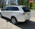 Белый Мицубиси Аутлендер, объемом двигателя 2.36 л и пробегом 71 тыс. км за 16500 $, фото 10 на Automoto.ua