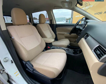 Белый Мицубиси Аутлендер, объемом двигателя 2.36 л и пробегом 215 тыс. км за 9500 $, фото 10 на Automoto.ua