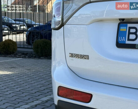Белый Мицубиси Аутлендер, объемом двигателя 2.4 л и пробегом 148 тыс. км за 12900 $, фото 11 на Automoto.ua