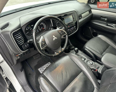 Белый Мицубиси Аутлендер, объемом двигателя 2.4 л и пробегом 175 тыс. км за 13900 $, фото 29 на Automoto.ua