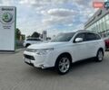 Белый Мицубиси Аутлендер, объемом двигателя 2.4 л и пробегом 183 тыс. км за 13100 $, фото 1 на Automoto.ua