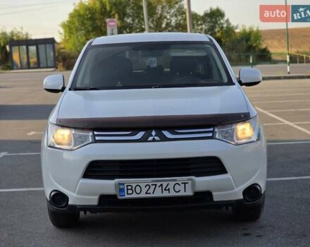 Белый Мицубиси Аутлендер, объемом двигателя 2.4 л и пробегом 183 тыс. км за 12499 $, фото 2 на Automoto.ua