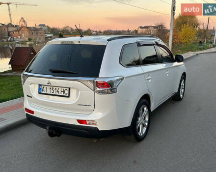 Белый Мицубиси Аутлендер, объемом двигателя 2 л и пробегом 127 тыс. км за 13200 $, фото 2 на Automoto.ua