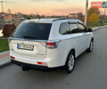 Белый Мицубиси Аутлендер, объемом двигателя 2 л и пробегом 127 тыс. км за 13200 $, фото 2 на Automoto.ua