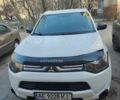 Білий Міцубісі Аутлендер, об'ємом двигуна 2.36 л та пробігом 250 тис. км за 11200 $, фото 1 на Automoto.ua