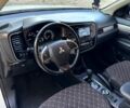 Белый Мицубиси Аутлендер, объемом двигателя 2 л и пробегом 223 тыс. км за 12800 $, фото 11 на Automoto.ua