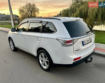 Белый Мицубиси Аутлендер, объемом двигателя 2 л и пробегом 127 тыс. км за 13200 $, фото 4 на Automoto.ua