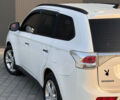 Білий Міцубісі Аутлендер, об'ємом двигуна 2.4 л та пробігом 240 тис. км за 12000 $, фото 5 на Automoto.ua
