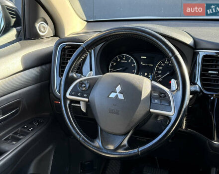 Белый Мицубиси Аутлендер, объемом двигателя 2.4 л и пробегом 148 тыс. км за 12900 $, фото 19 на Automoto.ua