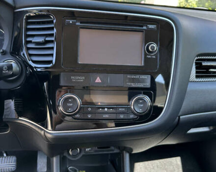 Белый Мицубиси Аутлендер, объемом двигателя 2.4 л и пробегом 114 тыс. км за 16800 $, фото 7 на Automoto.ua