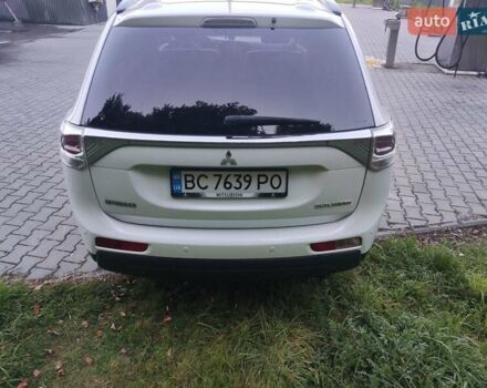 Білий Міцубісі Аутлендер, об'ємом двигуна 2.27 л та пробігом 232 тис. км за 12800 $, фото 17 на Automoto.ua