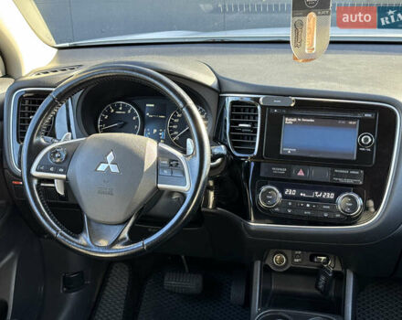 Белый Мицубиси Аутлендер, объемом двигателя 2.4 л и пробегом 148 тыс. км за 12900 $, фото 25 на Automoto.ua