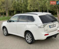 Белый Мицубиси Аутлендер, объемом двигателя 2 л и пробегом 229 тыс. км за 14500 $, фото 1 на Automoto.ua