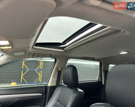 Белый Мицубиси Аутлендер, объемом двигателя 2.4 л и пробегом 175 тыс. км за 13900 $, фото 30 на Automoto.ua