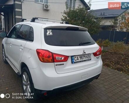 Белый Мицубиси Аутлендер, объемом двигателя 2 л и пробегом 203 тыс. км за 10750 $, фото 1 на Automoto.ua