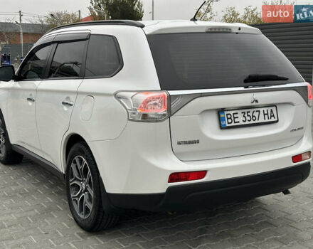 Белый Мицубиси Аутлендер, объемом двигателя 2.4 л и пробегом 175 тыс. км за 13900 $, фото 5 на Automoto.ua