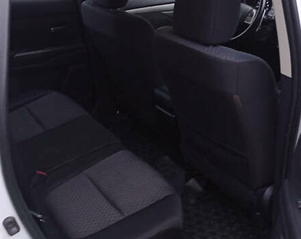 Білий Міцубісі Аутлендер, об'ємом двигуна 2.36 л та пробігом 112 тис. км за 14900 $, фото 8 на Automoto.ua