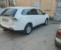 Белый Мицубиси Аутлендер, объемом двигателя 2.4 л и пробегом 248 тыс. км за 11500 $, фото 2 на Automoto.ua