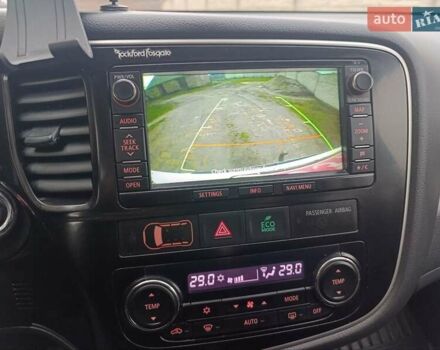 Белый Мицубиси Аутлендер, объемом двигателя 2.2 л и пробегом 278 тыс. км за 12600 $, фото 44 на Automoto.ua