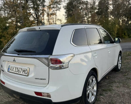 Белый Мицубиси Аутлендер, объемом двигателя 2.3 л и пробегом 250 тыс. км за 15000 $, фото 2 на Automoto.ua