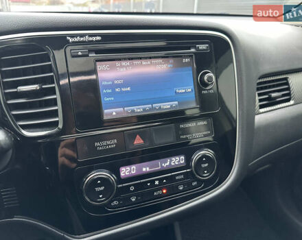 Белый Мицубиси Аутлендер, объемом двигателя 2.4 л и пробегом 175 тыс. км за 13900 $, фото 45 на Automoto.ua