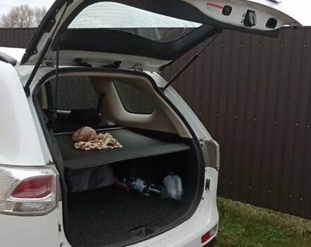 Білий Міцубісі Аутлендер, об'ємом двигуна 2.36 л та пробігом 112 тис. км за 14900 $, фото 9 на Automoto.ua