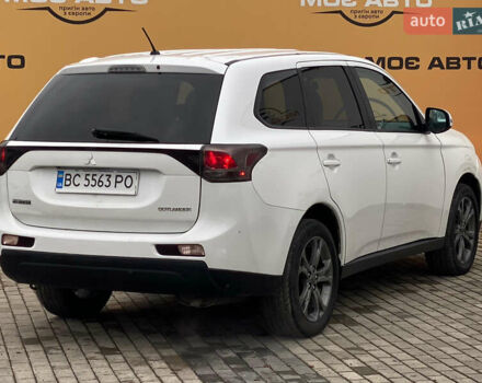 Белый Мицубиси Аутлендер, объемом двигателя 2.4 л и пробегом 215 тыс. км за 9999 $, фото 3 на Automoto.ua